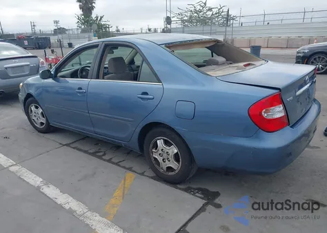 2002 Toyota Camry Le from USA, damaged, VIN JTDBE32K120041153